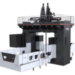 Vision Wide HFM Series Moving Beam 3-Axis CNC Machining Center. An ultra-large double column machine featuring a hydrostatic head, box-in-box crossbeam, and high torque for heavy cutting and automatic 5-face machining of massive components.