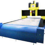 Vision Wide UC Series 5-Axis Ultrasonic Machining Center, featuring a specialized $\text{24,000 RPM}$ spindle with $\text{20 kHz}$ ultrasonicator frequency and a vacuum chuck system, designed for aerospace honeycomb structure processing.